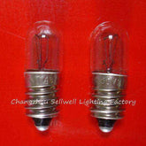 instruments bulb screw E10 lamp holders on red background pack of 10 small voltage bulbs