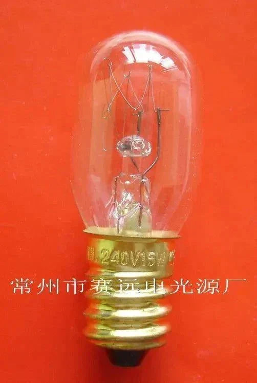 Miniature light 240v 15w E14 T20x52 clear glass bulb with gold base on red background