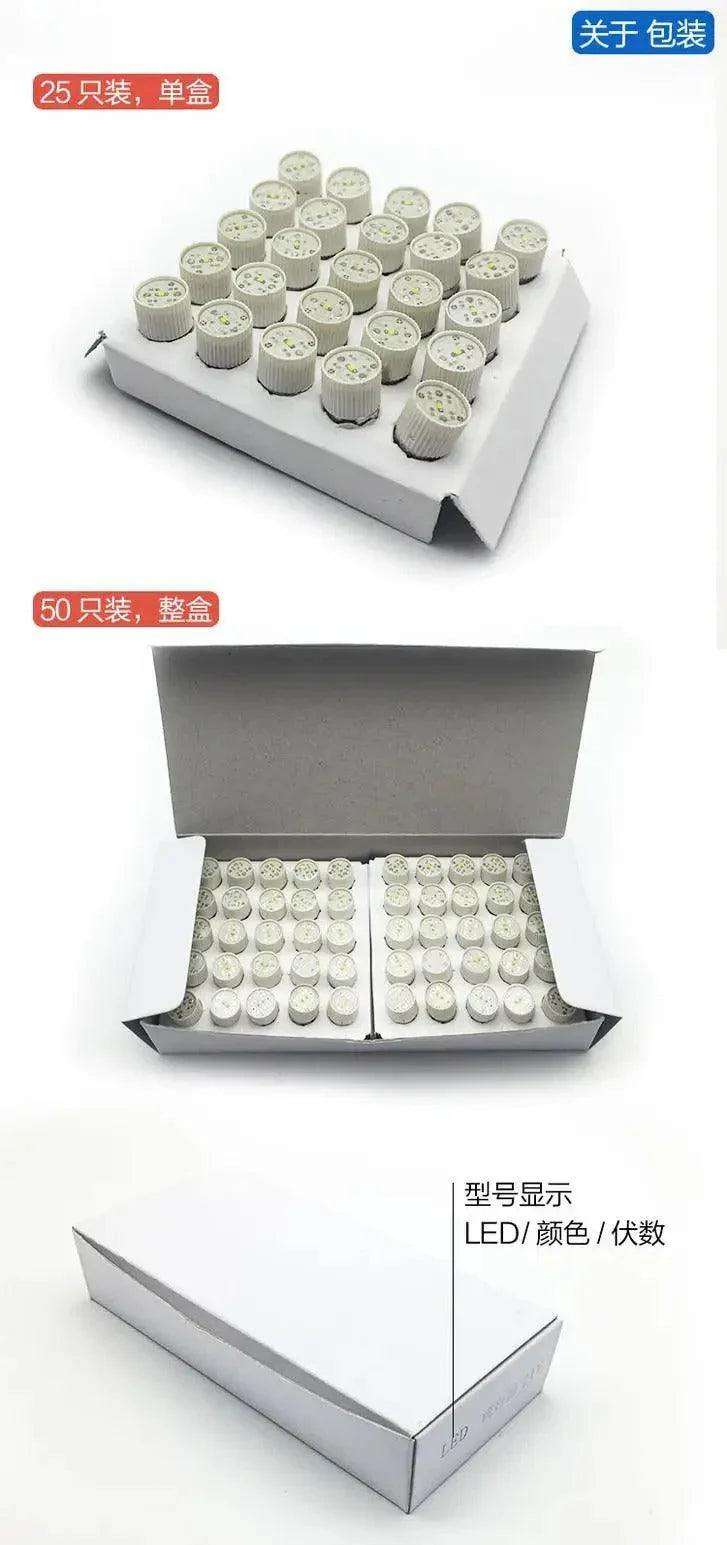 Mini LED BA9S E10 color indicator light bulbs in white packaging displayed in bulk quantity