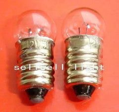 Miniature bulb 12v 5w with E10 base on orange background