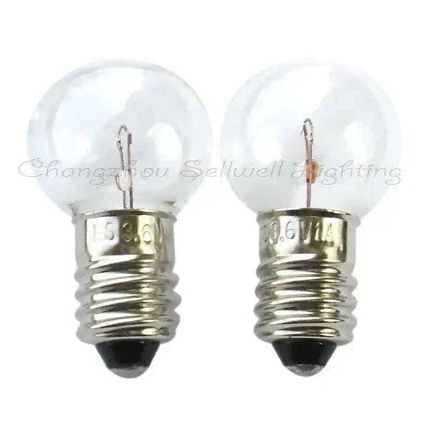 Miniature light 14v 5w E10 base clear bulb 18mm diameter 30mm length pair