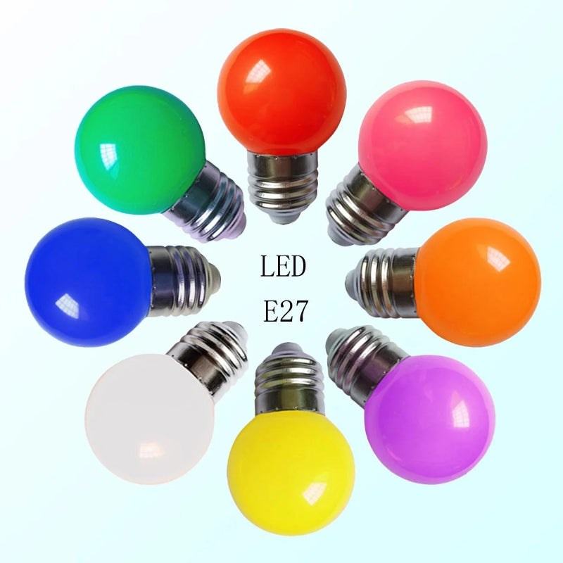 LED color household E27 screw bulbs in red yellow blue orange green purple and white colors arranged in a circle
